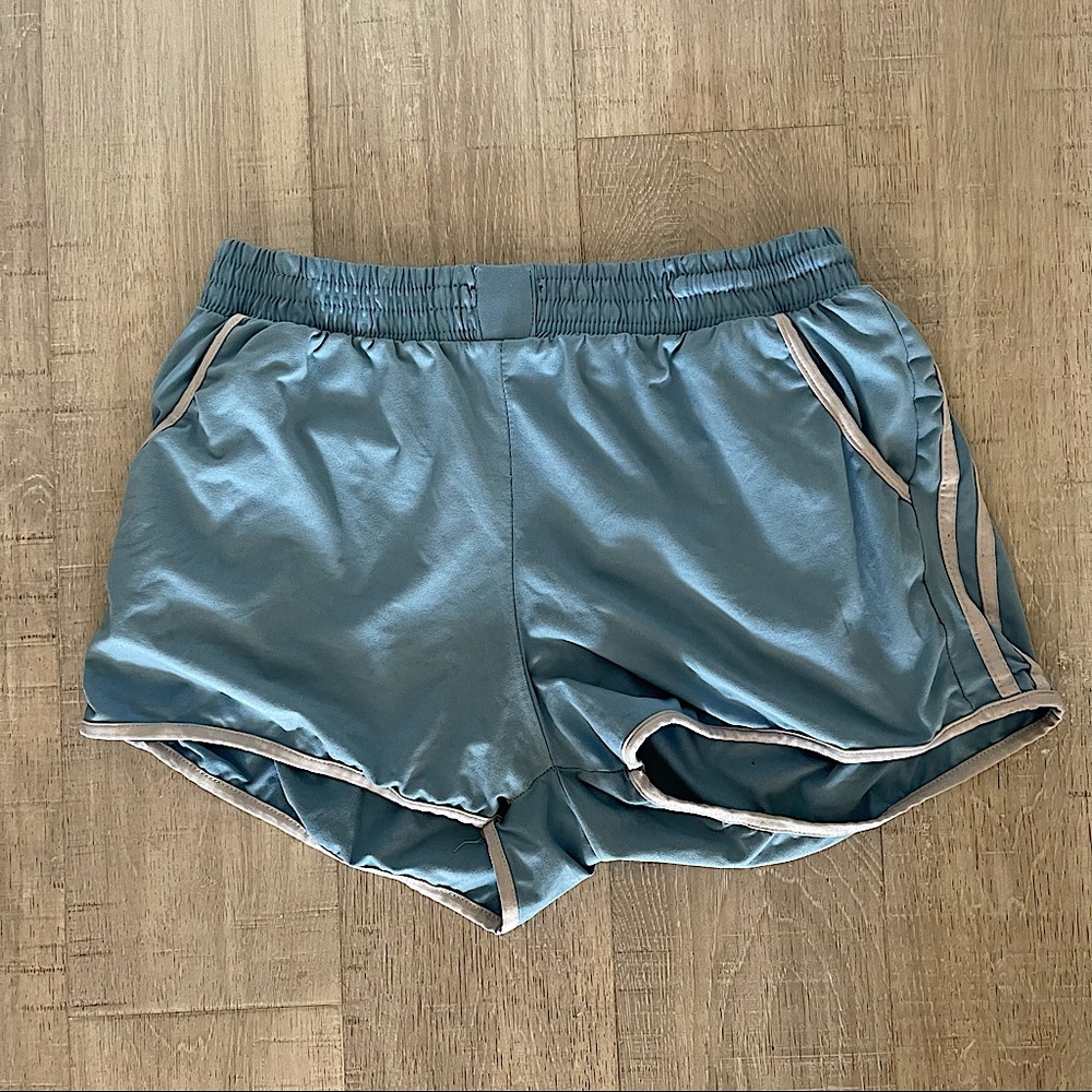 INDERO Women’s L/XL light blue/baby blue athletic shorts.
